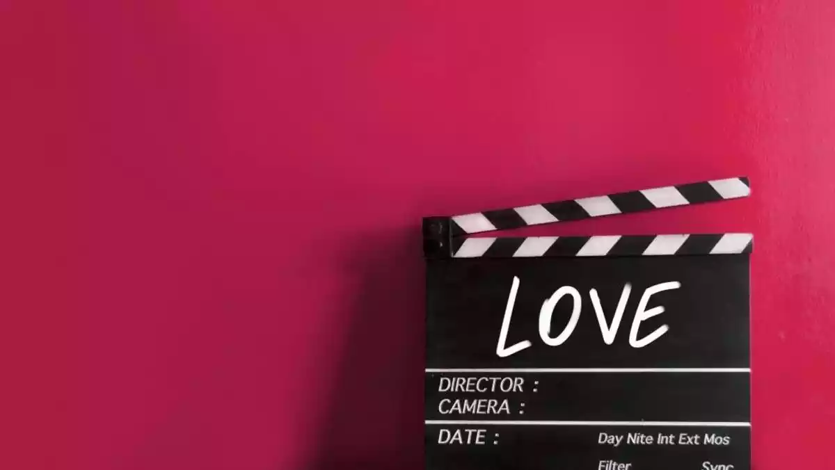Clapperboard with the word Love on it
