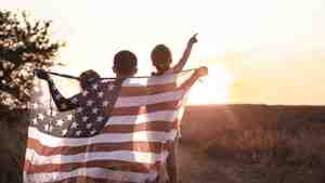 Patriotic kids with a flag of the United States